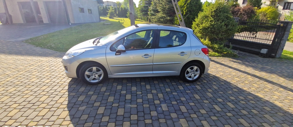 Peugeot 207 cena 16800 przebieg: 129107, rok produkcji 2010 z Bełchatów małe 407